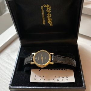 Black and gold watch with diamond
